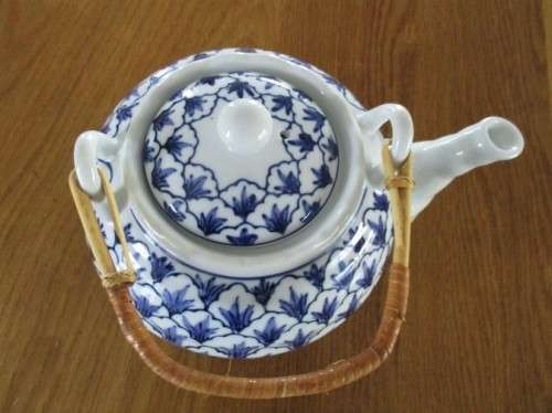 BLUE AND WHITE TEAPOT DESIGNED BY SWEDISH DESIGNER, LISA LARSEN