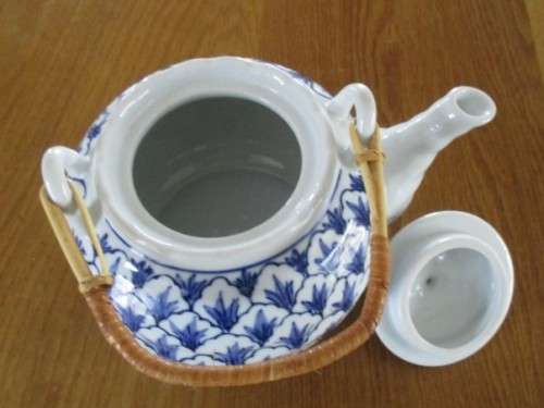 BLUE AND WHITE TEAPOT DESIGNED BY SWEDISH DESIGNER, LISA LARSEN