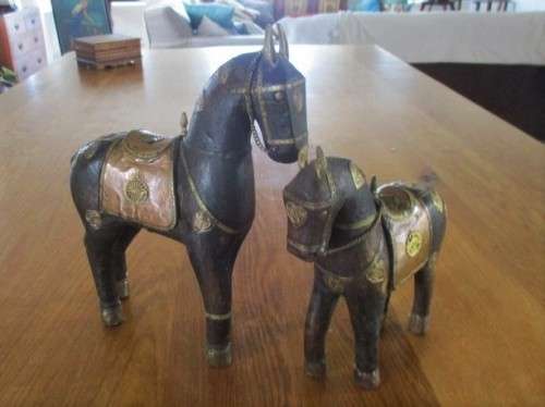 TWO VERY OLD HAND CRAFTED WOODEN HORSES WITH COPPER AND BRASS INLAYS FROM INDIA/MIDDLE EAST