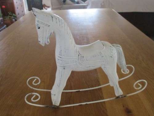 A CUTE VINTAGE WOODEN ROCKING HORSE