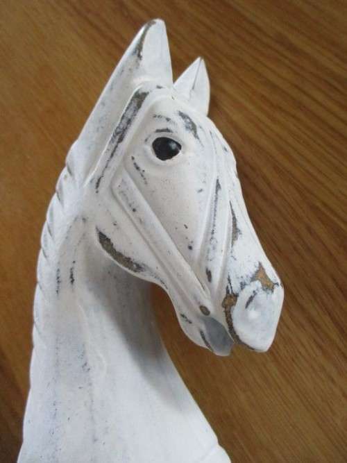 A CUTE VINTAGE WOODEN ROCKING HORSE