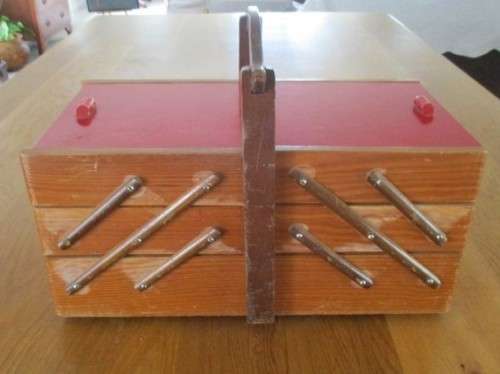 A  VINTAGE WOODEN FOLD-OPEN SEWING BOX - VERY STURDY BUT WOOD NEEDS SANDING  ON OUTSIDE