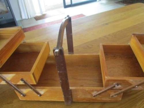 A  VINTAGE WOODEN FOLD-OPEN SEWING BOX - VERY STURDY BUT WOOD NEEDS SANDING  ON OUTSIDE