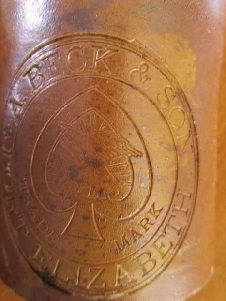 ANTIQUE VICTORIAN STONEWARE GINGER BEER BOTTLE MADE BY BARNETT & FOSTER LONDON FOR A. BECK & SON, PE