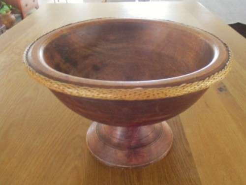 FOR WERNER ONLY - VERY LARGE SOLID WOOD FOOTED FRUIT BOWL WITH WOVEN BASKET WORK EDGING