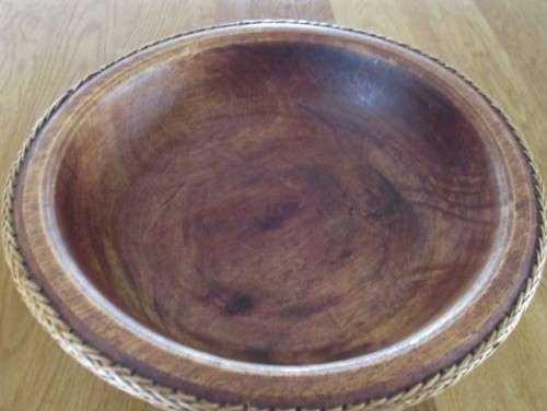 FOR WERNER ONLY - VERY LARGE SOLID WOOD FOOTED FRUIT BOWL WITH WOVEN BASKET WORK EDGING
