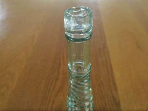 AN UNUSUAL VINTAGE/ANTIQUE BOTTLE