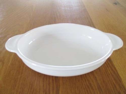 A SMALL, HANDY CORNING WARE PIE DISH