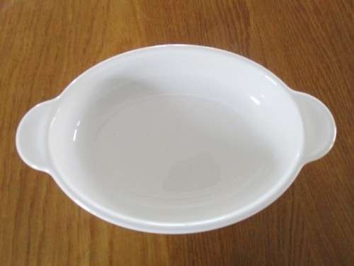 A SMALL, HANDY CORNING WARE PIE DISH