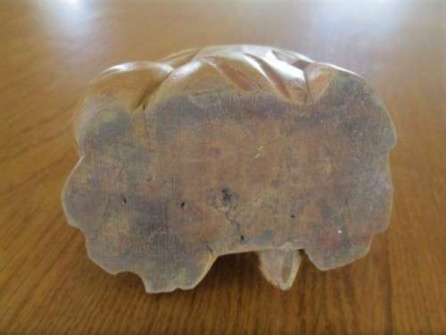 A NICE-SIZED CARVED WOODEN BUDDHA