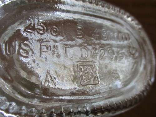 PRETTY AND UNUSUAL -  CANADIAN MAPLE LEAF SHAPED BOTTLE