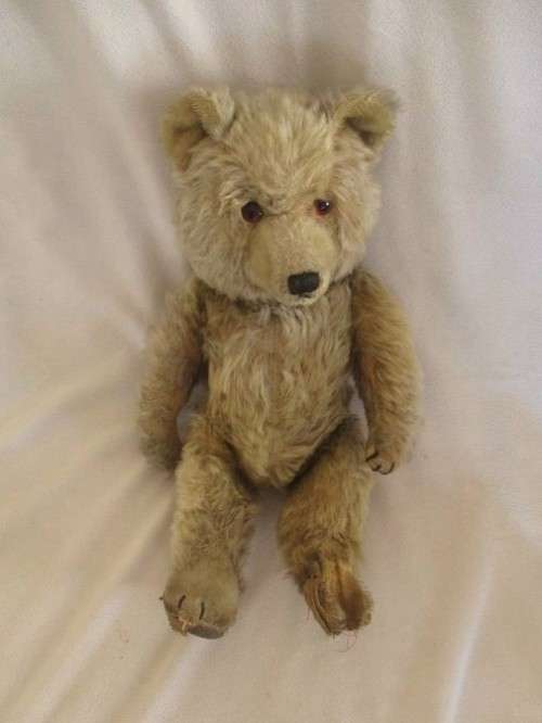 GRANNY'S LITTLE SHRINE - A BATCH OF ANTIQUE, VERY MUCH LOVED TEDDY BEARS