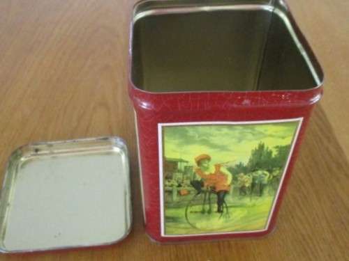 PRETTY COFFEE TIN WITH GIRL ON PENNY FARTHING BICYCLE