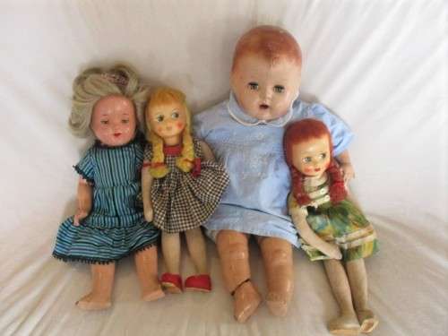 TWO ANTIQUE COMPOSITION AND TWO ANTIQUE POLISH DOLLS IN NEED OF TLC AND A NEW LIFE