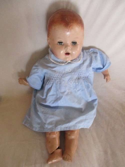 TWO ANTIQUE COMPOSITION AND TWO ANTIQUE POLISH DOLLS IN NEED OF TLC AND A NEW LIFE