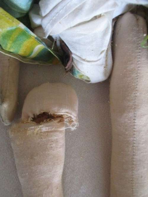 TWO ANTIQUE COMPOSITION AND TWO ANTIQUE POLISH DOLLS IN NEED OF TLC AND A NEW LIFE