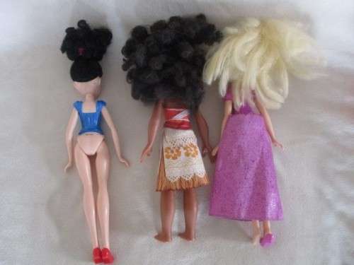 EIGHT COLLECTABLE DOLLS ( BRATZ, STEFFI LOVE AND DISNEY) IN NEED OF TLC,SHAMPOO AND CONDITIONER