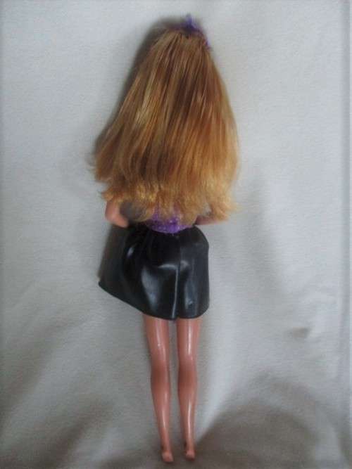 A VINTAGE MATTEL BARBIE DOLL WITH MINOR IMPERFECTIONS