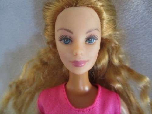 A LOVELY MATTEL BARBIE DOLL WITH THE MOST BEAUTIFUL FACE