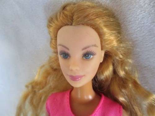 A LOVELY MATTEL BARBIE DOLL WITH THE MOST BEAUTIFUL FACE