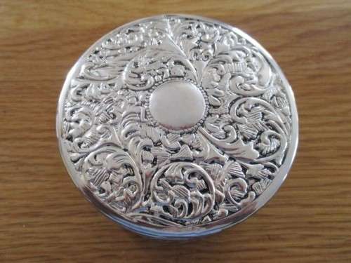 VERY DECORATIVE SILVER METAL TRINKET BOX WITH RED VELVET LINING (PLEASE DISREGARD REFLECTIONS)