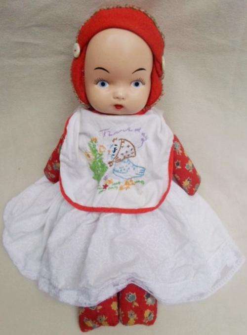 A LOVELY VINTAGE DOLL! WITH HAND EMBROIDERED BIB!