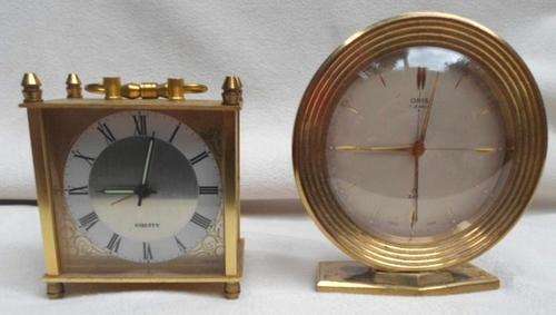 TWO VINTAGE AND COLLECTABLE ALARM CLOCKS IN WORKING CONDITION!!