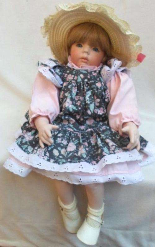 A PRETTY LARGE PORCELAIN DOLL IN VERY GOOD CONDITION!!