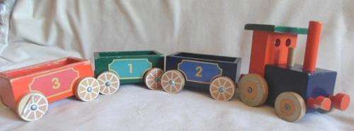 A VINTAGE WOODEN LOCOMOTIVE WITH THREE CARRIAGES!!