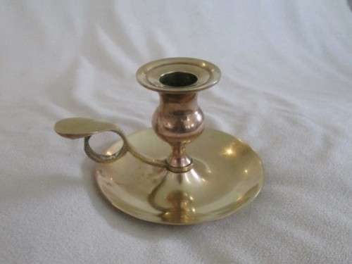 AN OLD FASHIONED SOLID BRASS `WEE WILLIE WINKIE`  CANDLESTICK