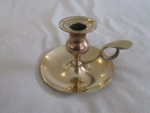 AN OLD FASHIONED SOLID BRASS `WEE WILLIE WINKIE`  CANDLESTICK