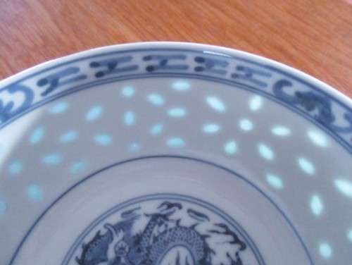 VINTAGE BOWL WITH TRANSLUSCENT RICE GRAIN PATTERN AND CENTER DRAGON - SIGNED