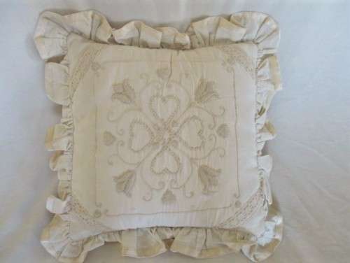 A PRETTY, FEMININE CUSHION BEAUTIFULLY EMBROIDERED WITH CANDLEWICK TULIP DESIGN