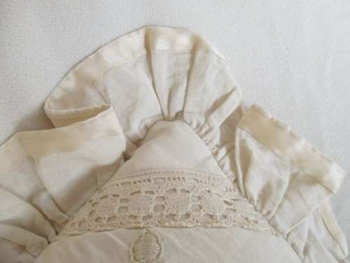 A PRETTY, FEMININE CUSHION BEAUTIFULLY EMBROIDERED WITH CANDLEWICK TULIP DESIGN