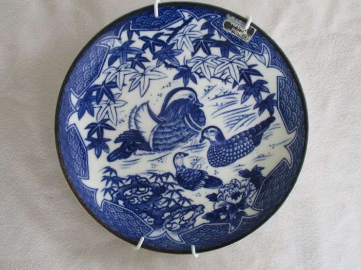 Blue and white genuine Imari plate depicting detailed Mandarin ducks (plus wall hanger)