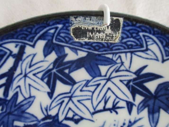 Blue and white genuine Imari plate depicting detailed Mandarin ducks (plus wall hanger)