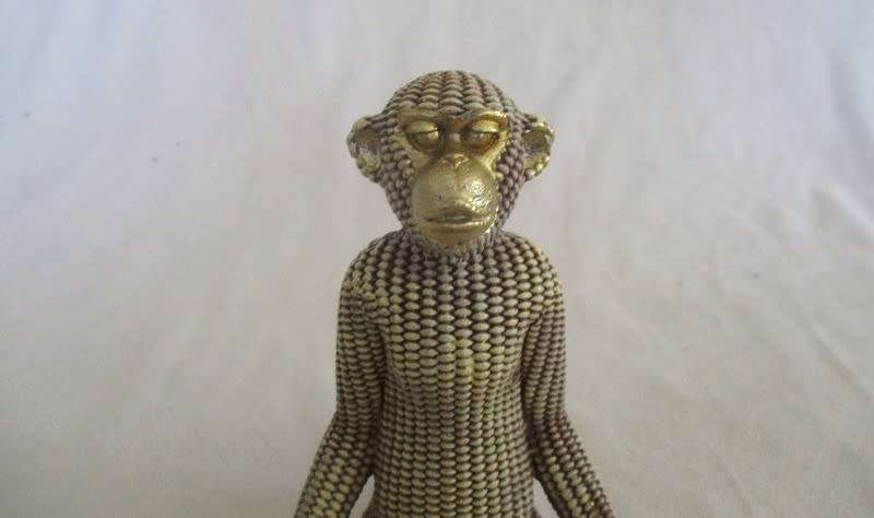 Gold ceramic Monkey in Yoga pose - a reminder to breathe on hectic days
