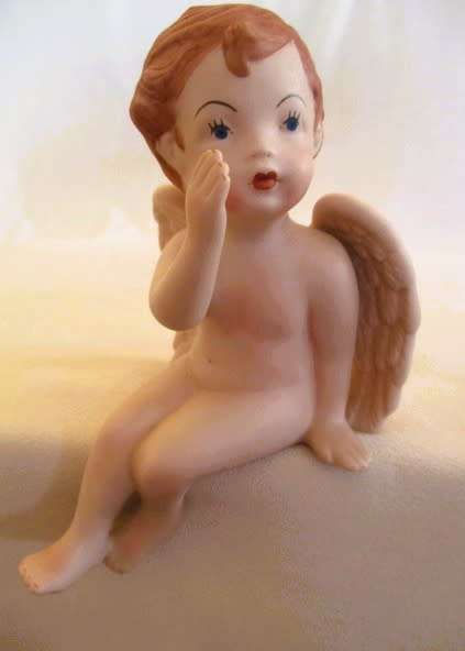 Larger than most -  a trio of adorable vintage hand painted ceramic cherubs - Scioto?