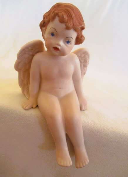 Larger than most -  a trio of adorable vintage hand painted ceramic cherubs - Scioto?