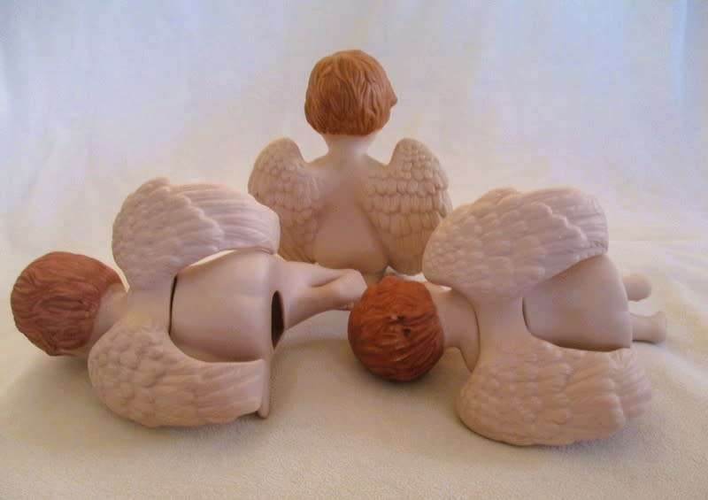 Larger than most -  a trio of adorable vintage hand painted ceramic cherubs - Scioto?