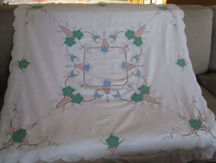 A large vintage embroidered Madeira table cloth with lovely detail