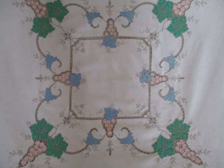 A large vintage embroidered Madeira table cloth with lovely detail