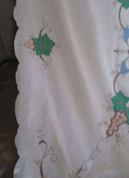 A large vintage embroidered Madeira table cloth with lovely detail