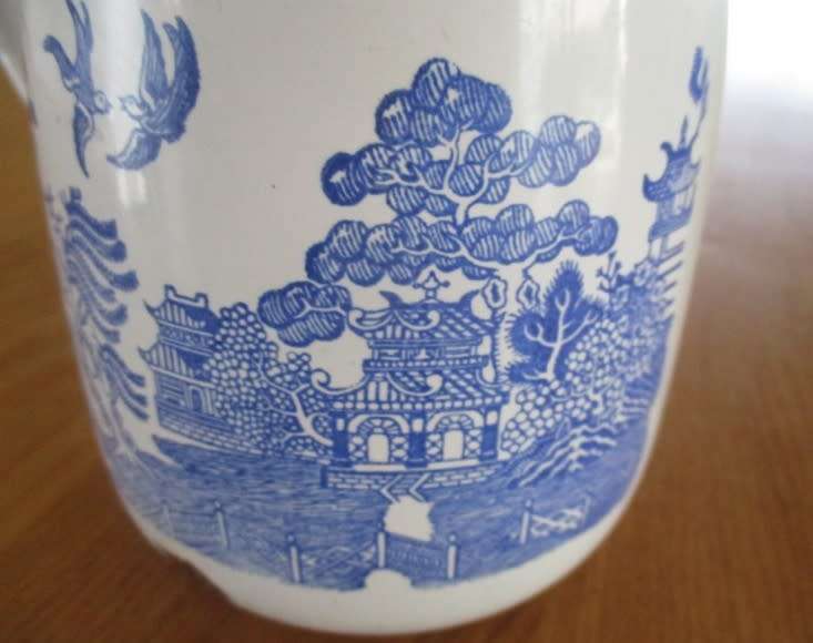 Out of Grandma`s Attic - vintage/antique willow pattern enamel jug for your cut flowers
