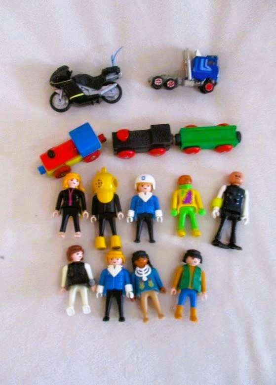 Eight Playmobil figures with size-compatible extras