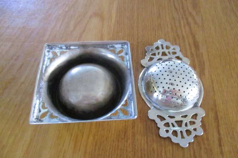 Vintage tea strainer and holder - made in England