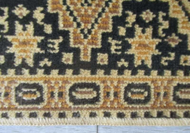 Two small Persian-style woven table mats