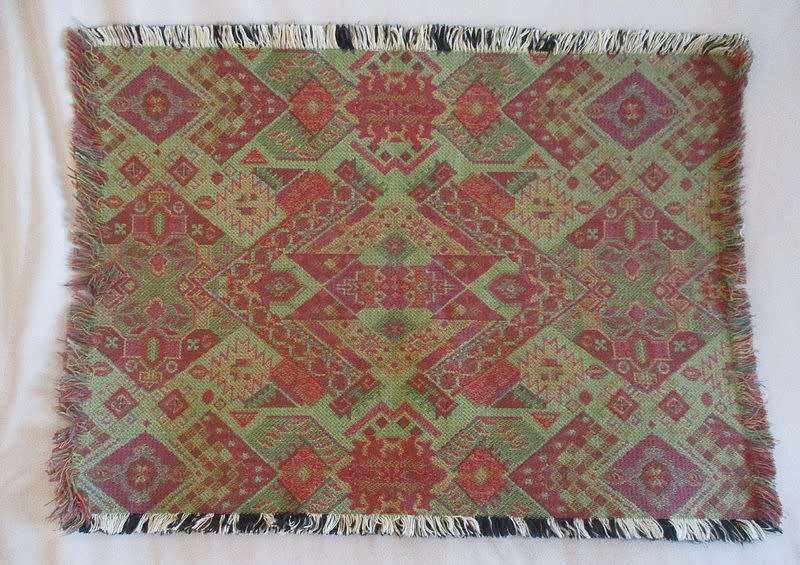 A larger quality reversable tray cloth made from woven material