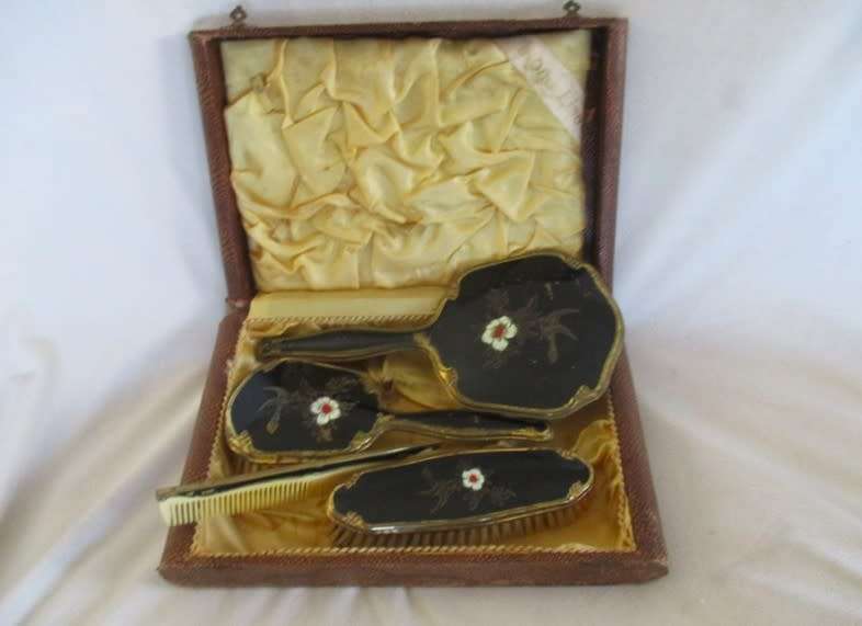 Vintage/antique hand painted enamel four piece Mona Lisa vanity brush set in original box