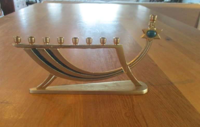 A small vintage Hanukkah Menorah made in Israel - 9 candles